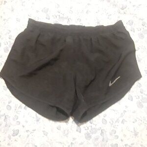 Womans xtra small black Nike running shorts w/ built in lining, drawstring waist